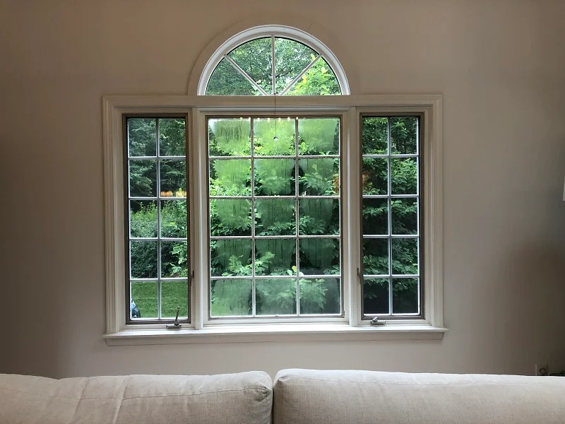 Triple casement window in Wilton,CT with fogged glass